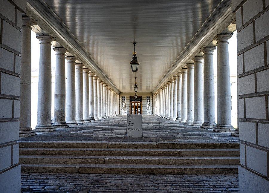 Long stone colonnade with a hanging lantern, Greenwich
