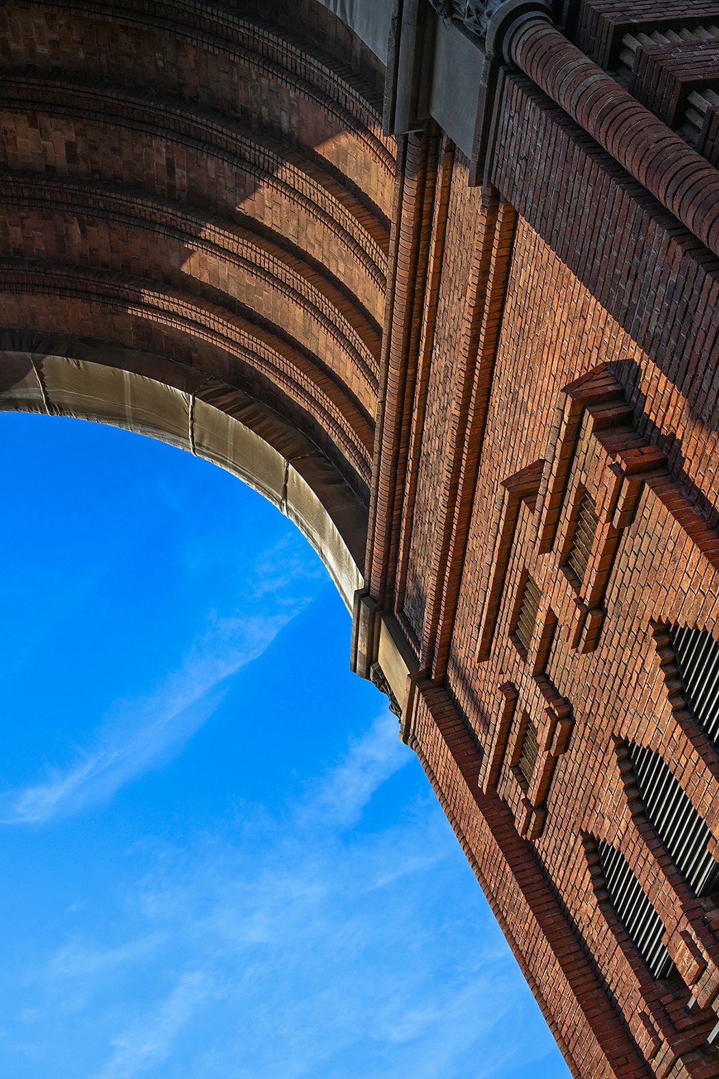 Brick arch against a blue sky, Arc de Triomf, Barcelona