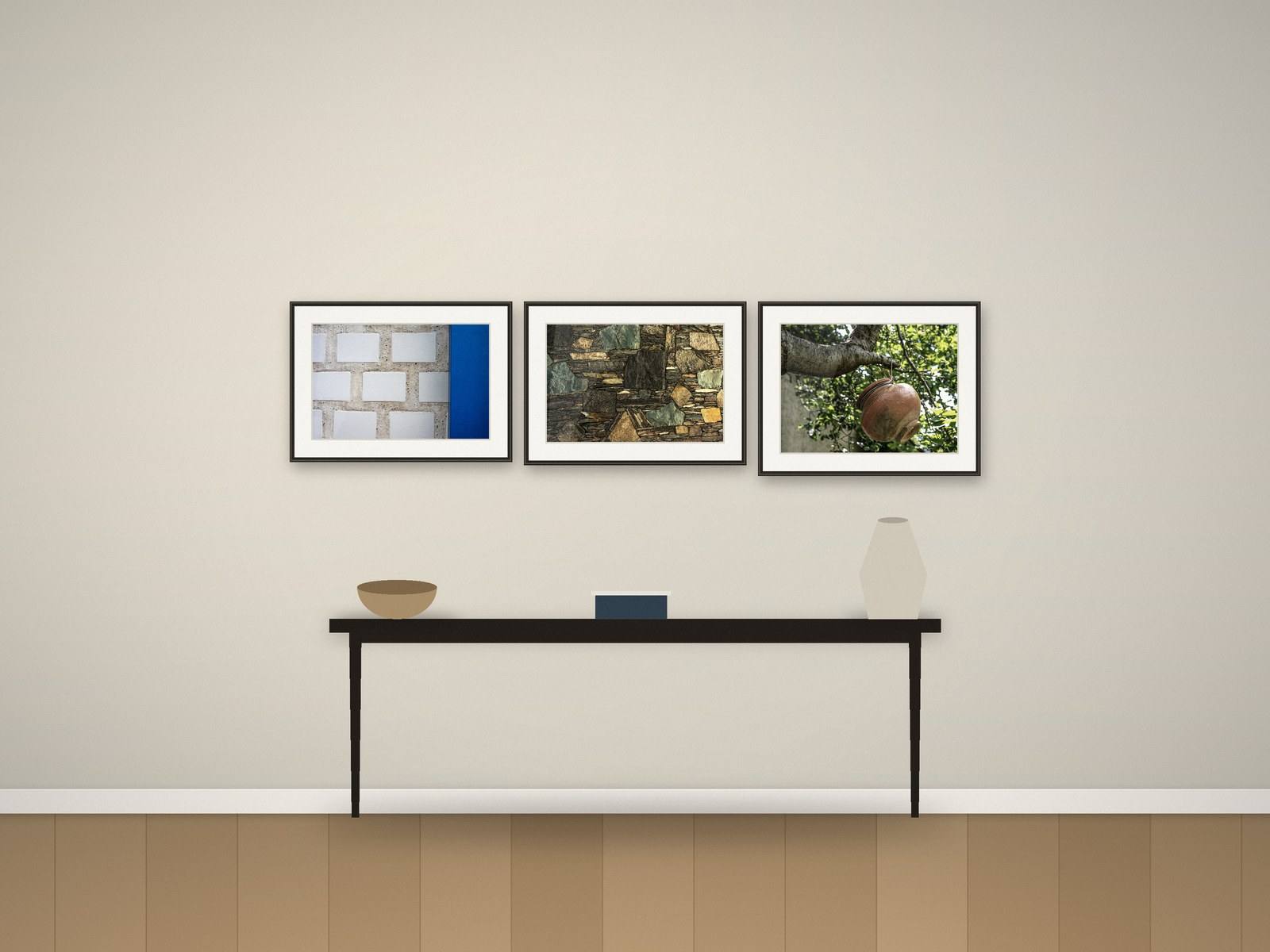 Illustration: three framed photographs above a hallway console