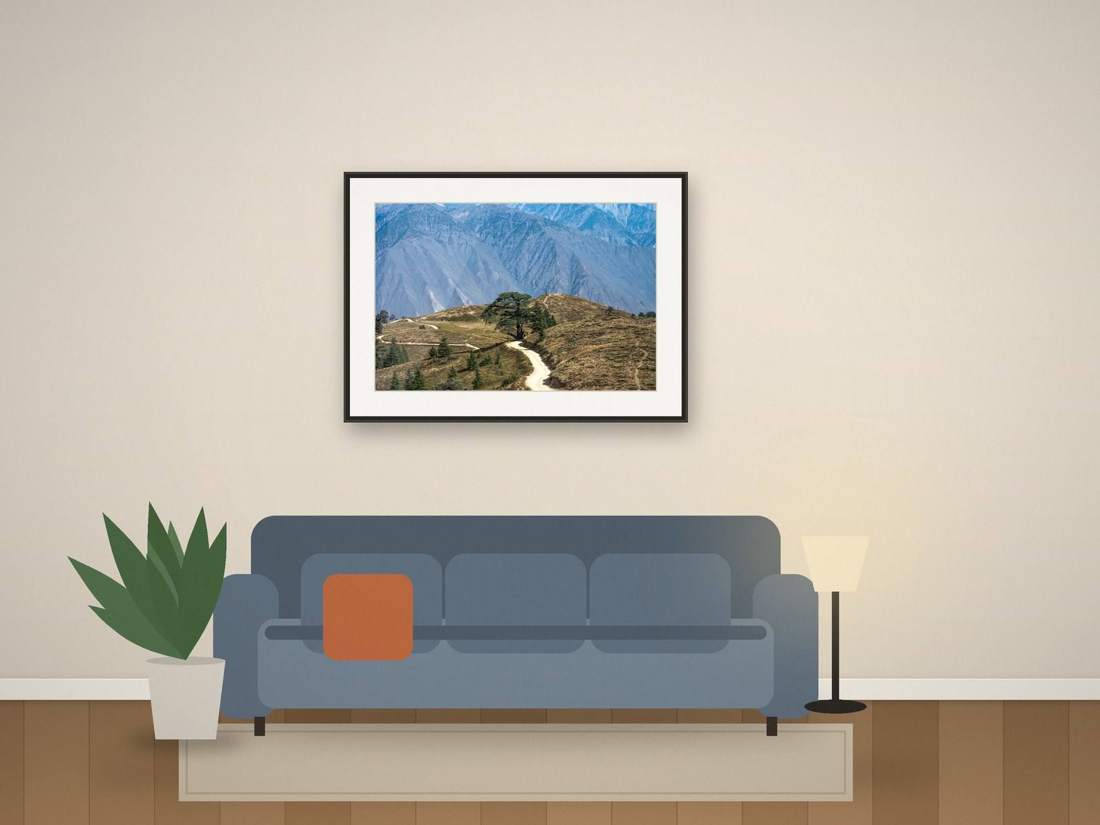 Illustration: mountain landscape in a frame above a sofa in a living room