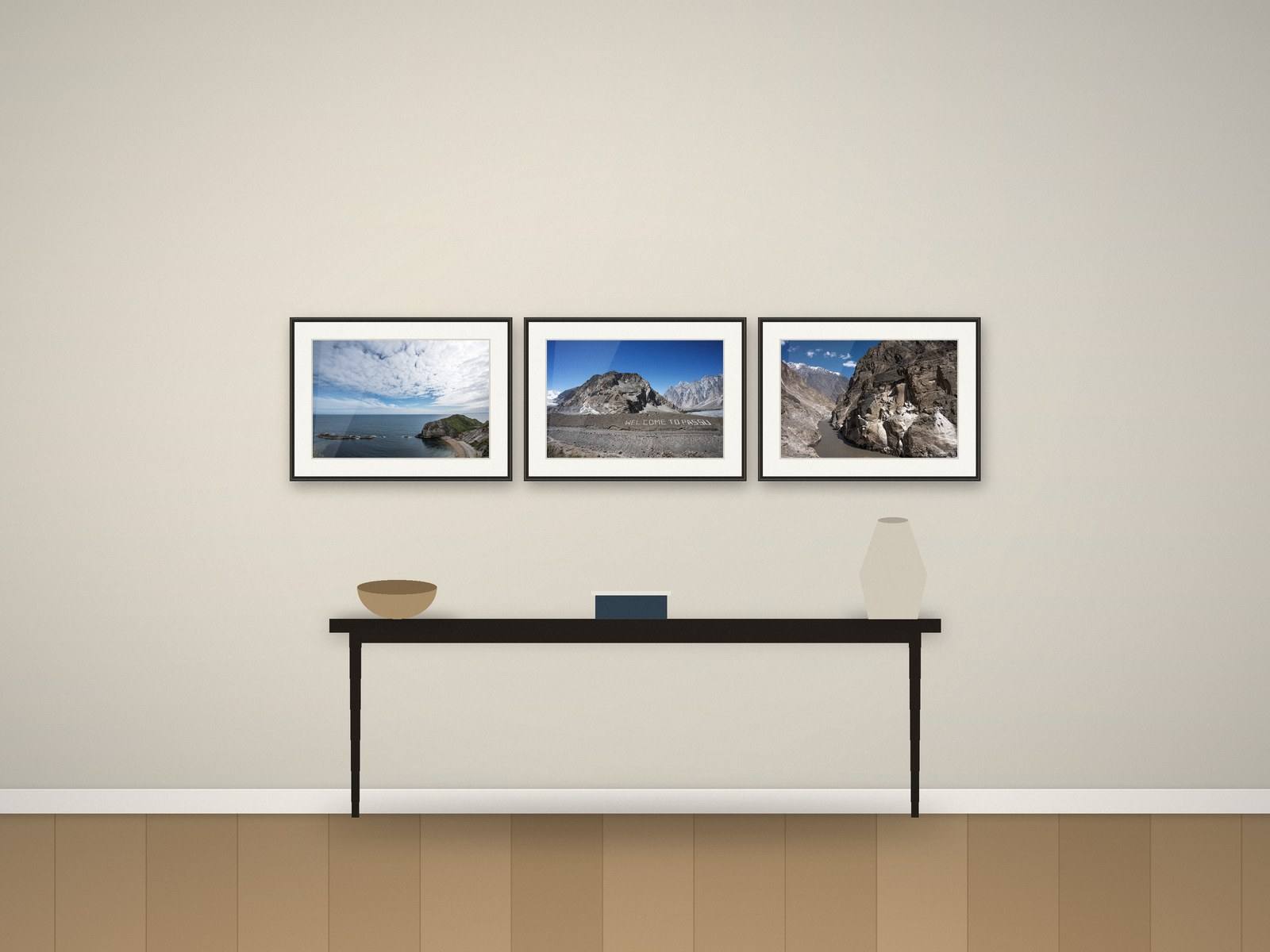 Illustration: three landscape photographs above a hallway console
