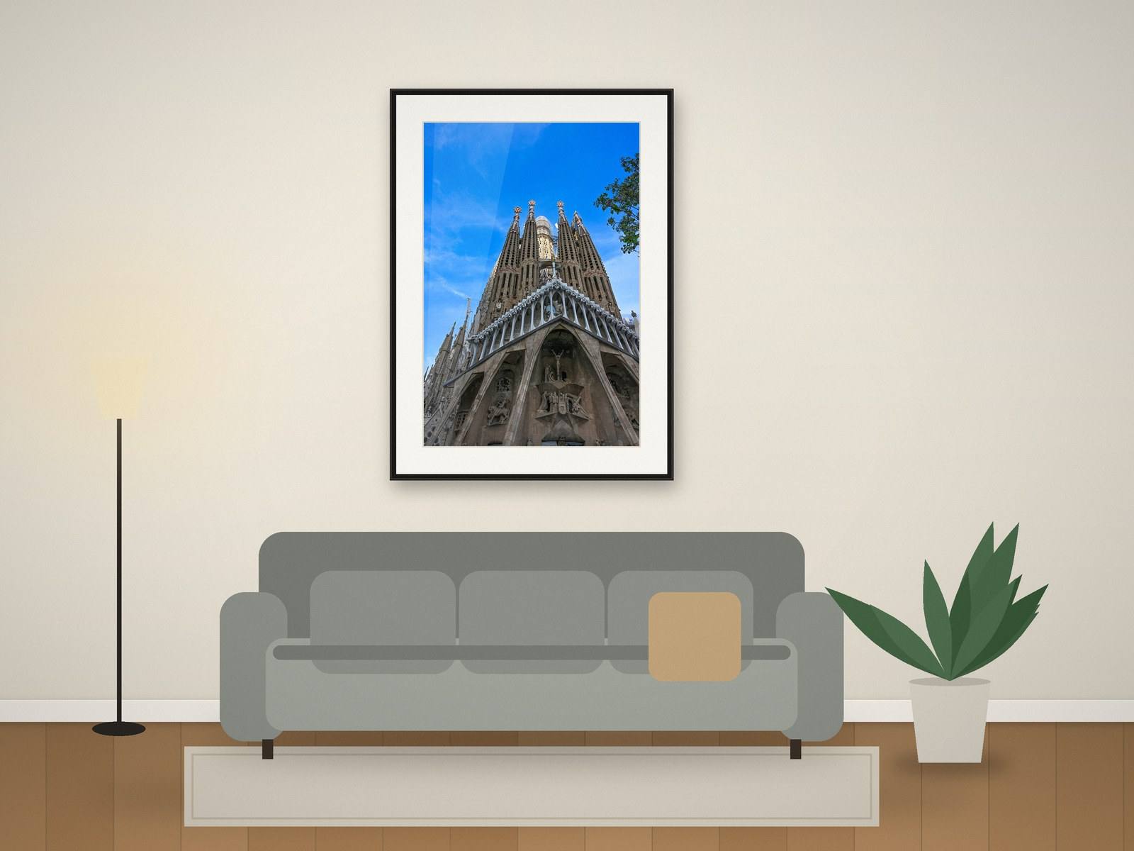 Illustration of a large framed Sagrada Família photograph above a sofa in a living room