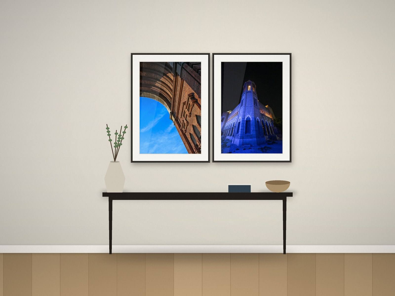 Illustration of two framed architecture photographs above a hallway console table